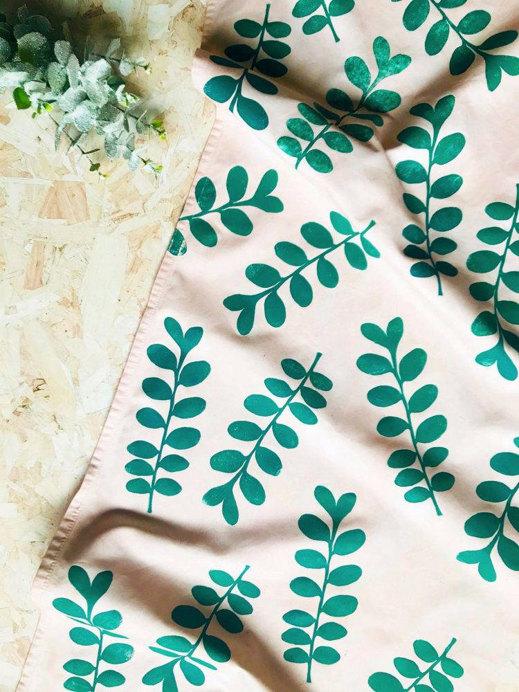 Hayley Anderson green leaves Cream fabric with green printed leaves