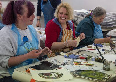 People attending a printing workshop