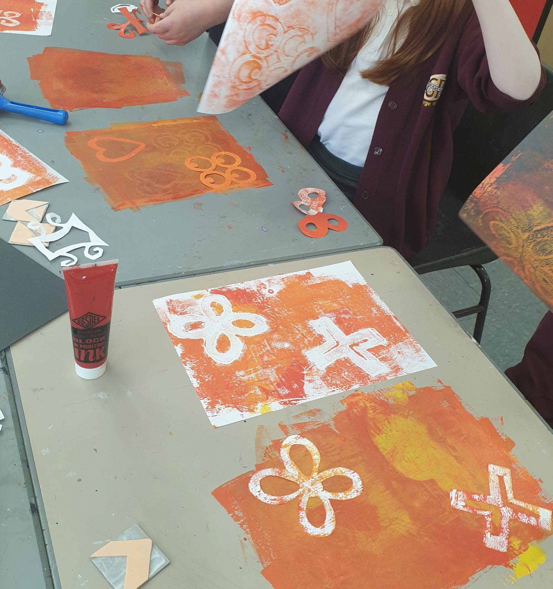 Photo of children learning to monoprint