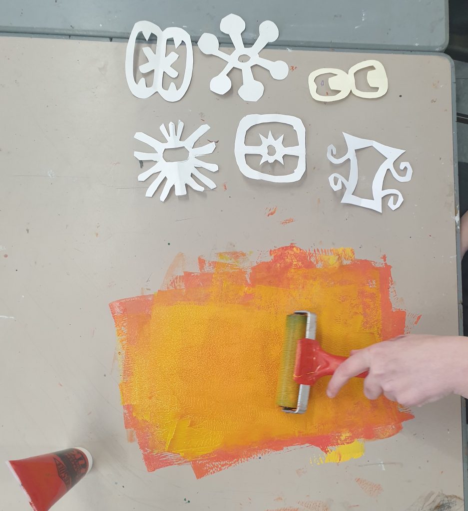 Photo of children learning to monoprint