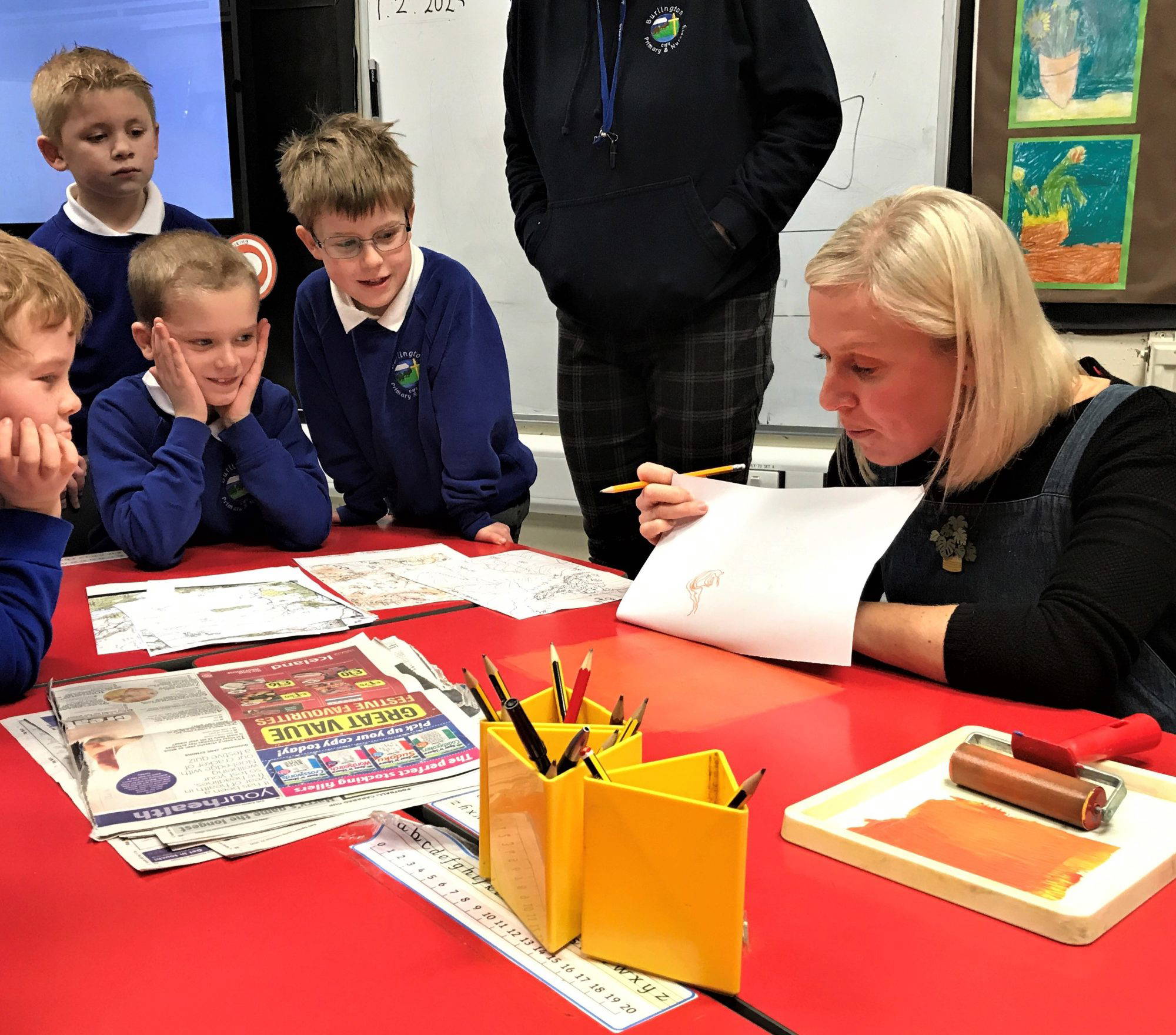 Photo of children learning to monoprint