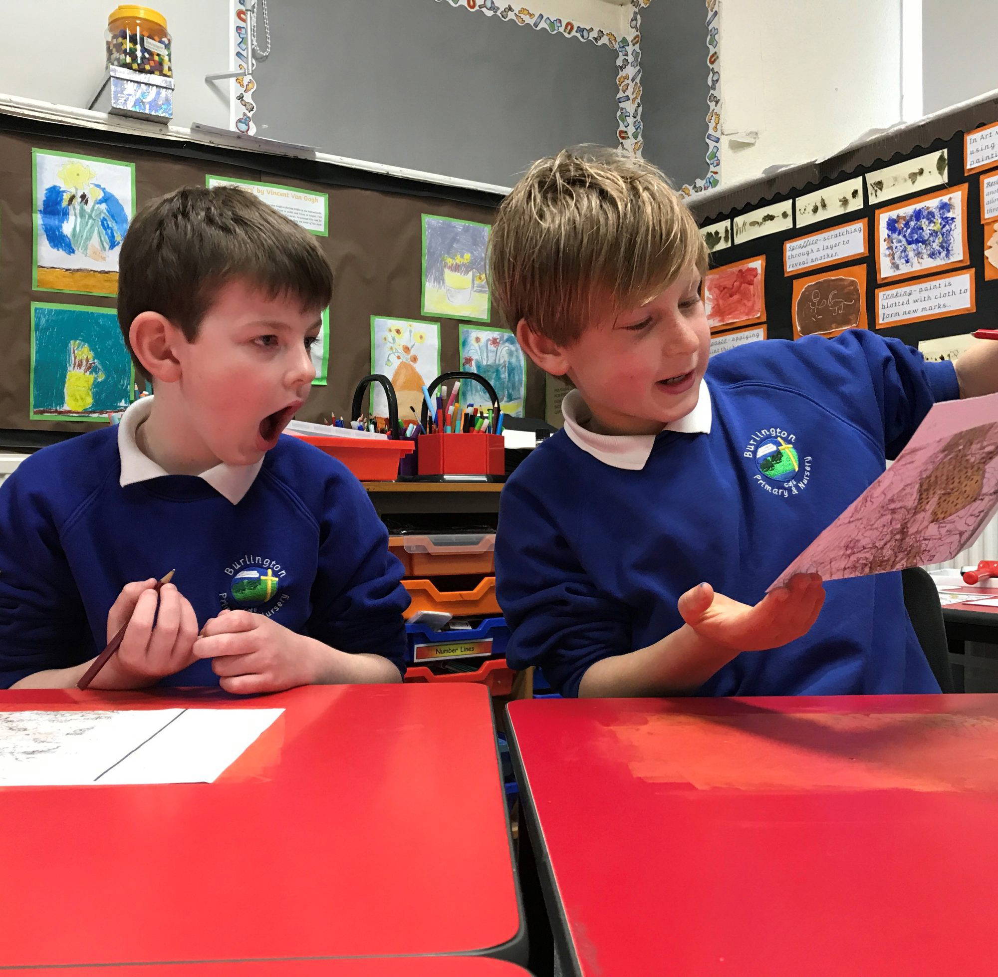 Photo of children learning to monoprint