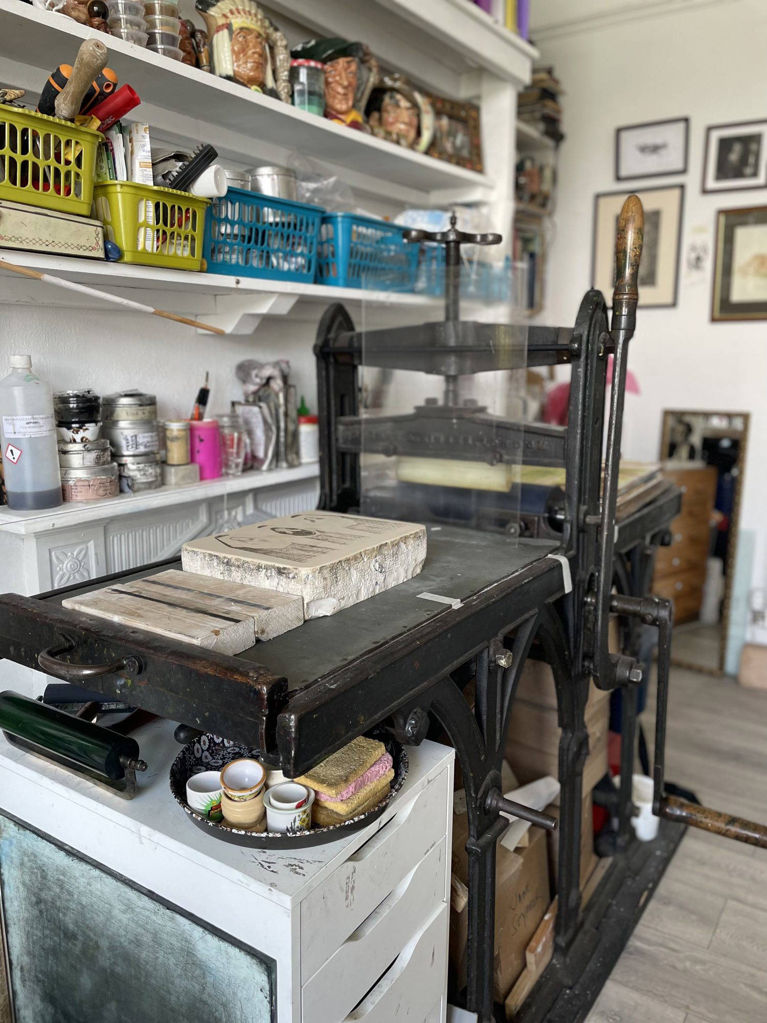 Photo of artist Scarlett Rebecca's studio with lithopress