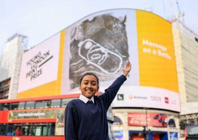 Sara Ahmed, winnner of YLPP2022, at the Piccadilly Lights