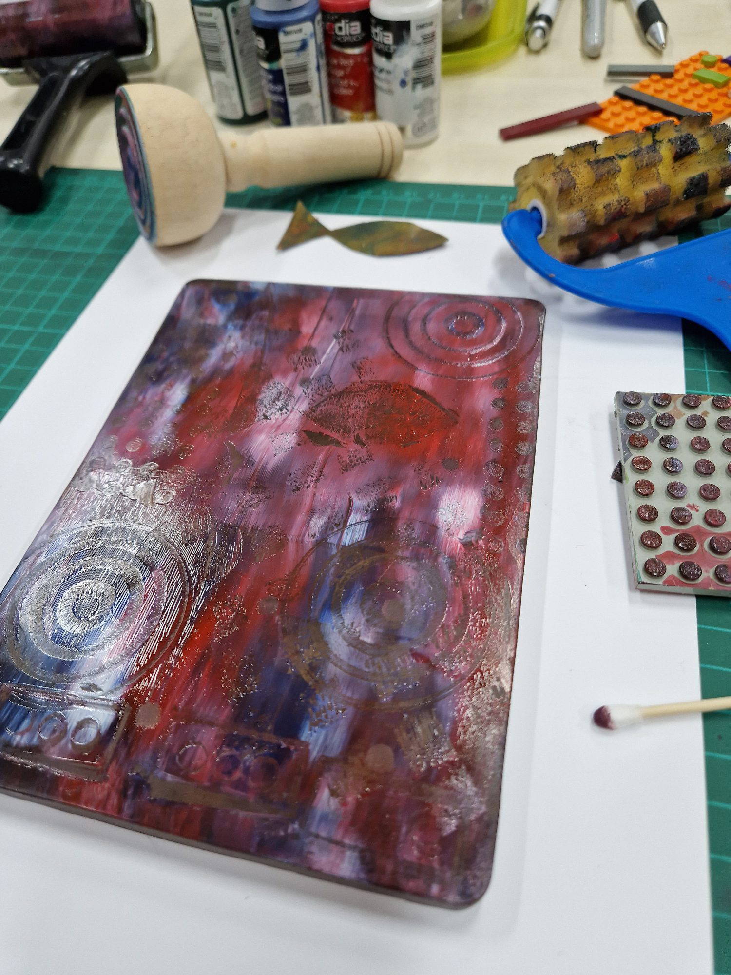 Gelli plate with red and blue in