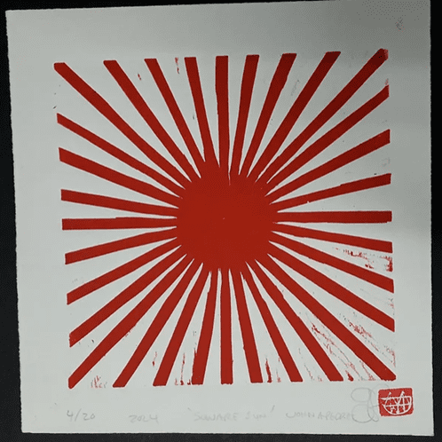 Woodcarving print by John Pedder of a red sun