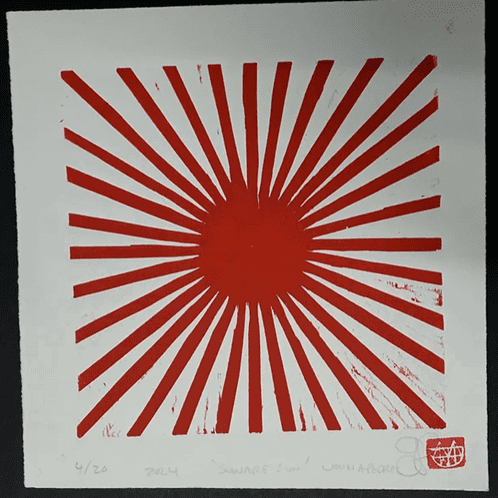 Woodcarving print by John Pedder of a red sun