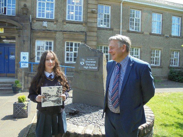 Winner Asya Ozmus recieves cetificate from Head teacher Mr Hardwick